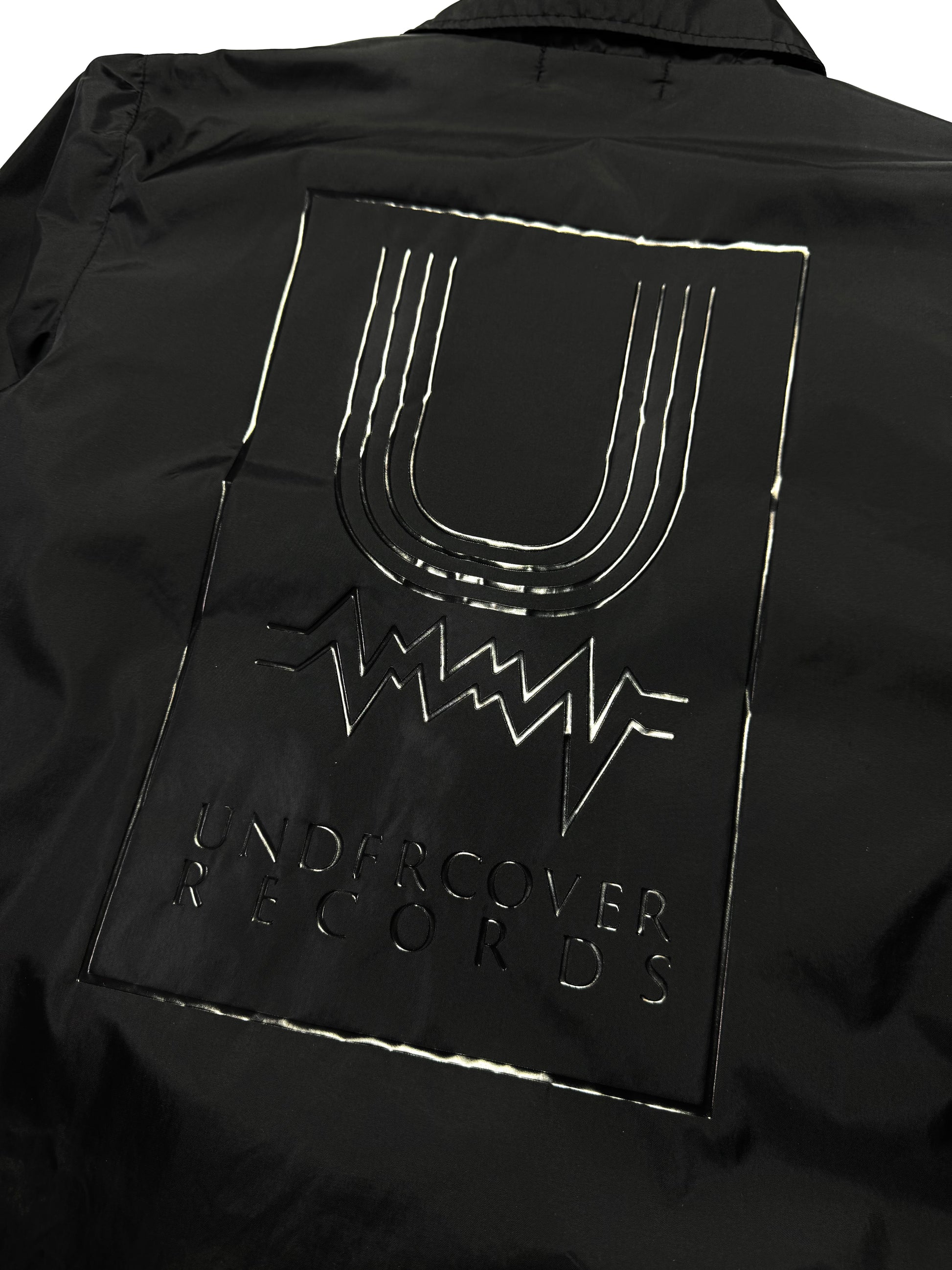 Undercover “Music Record” Black Layered Coach Jacket