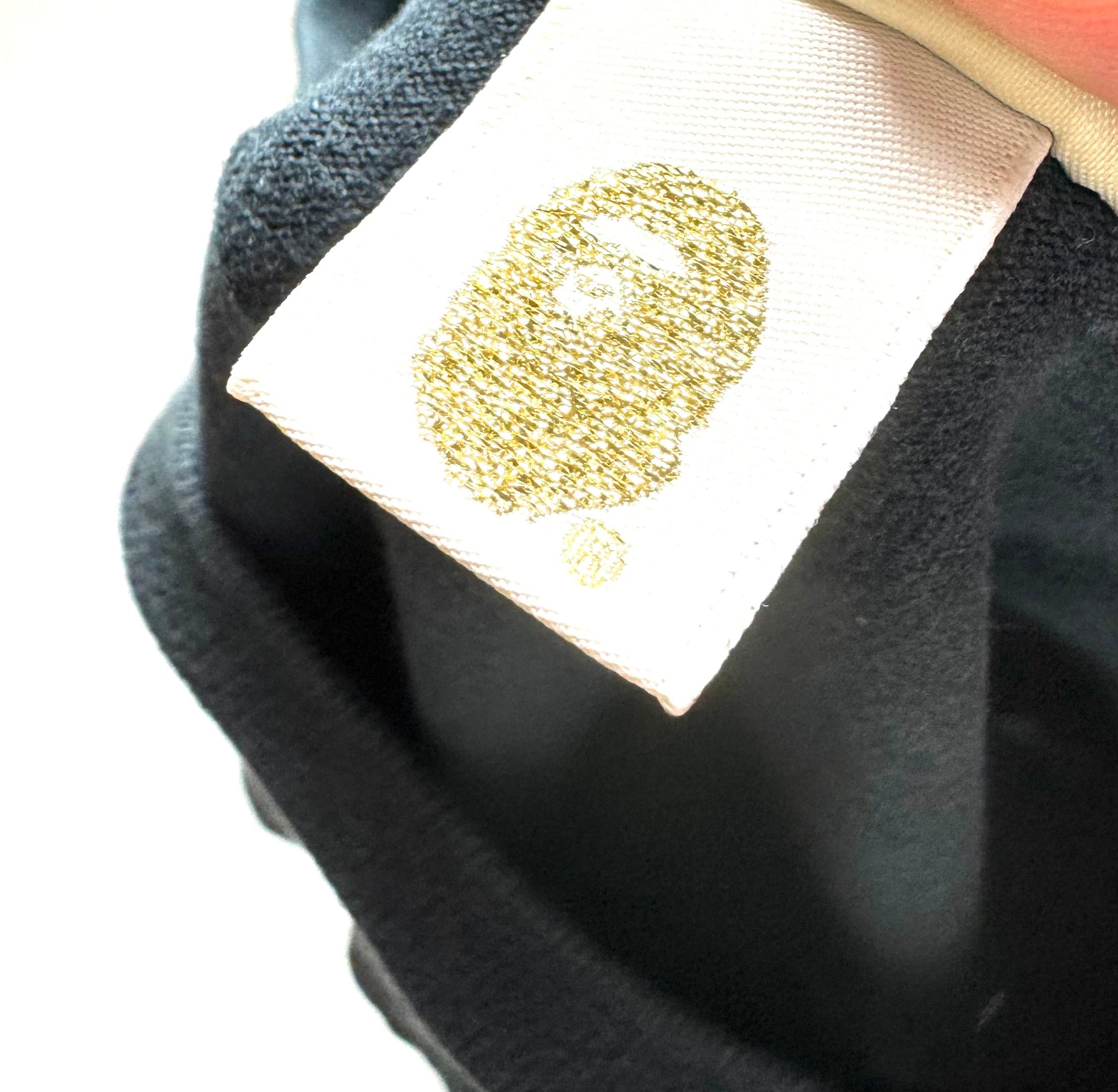 BAPE “ Bathing Ape” Spell Out Tee