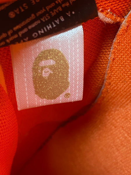 BAPE x Heron Preston Orange Camo BAPESTA